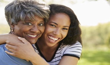 SolidOffers empowering homeowners of all ages mom and daughter hugging